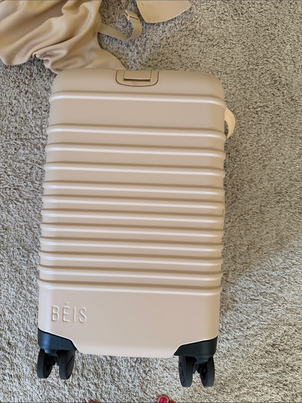BEIS Textured Small Carry-On Spinner in Blush Beige with cover